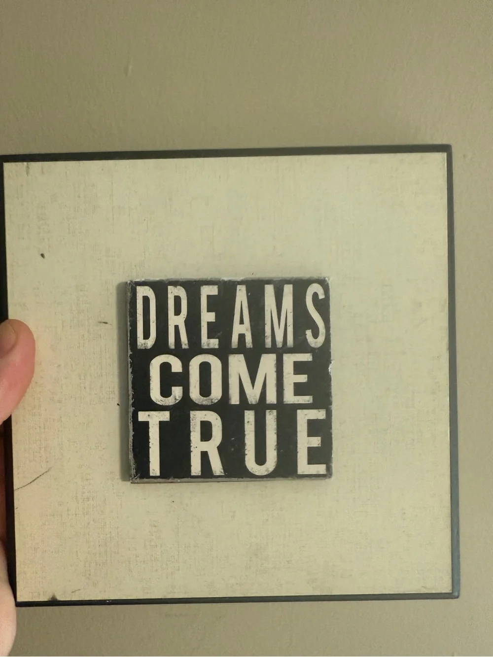 inspirational wall plaques feature distressed black typography on a white